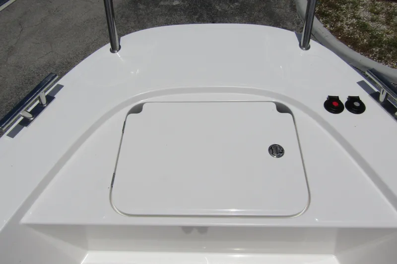 Slide: The Image of 2025 Nimbus Tender 11 boat deck with storage hatch and railing. - 7