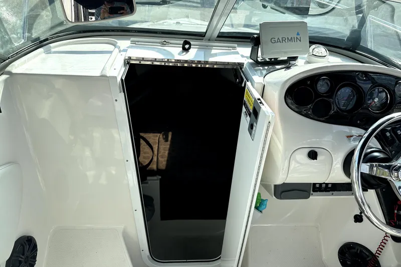 Slide: The Image of Interior view of a 2021 Campion A21 boat cockpit with Garmin navigation system. - 10