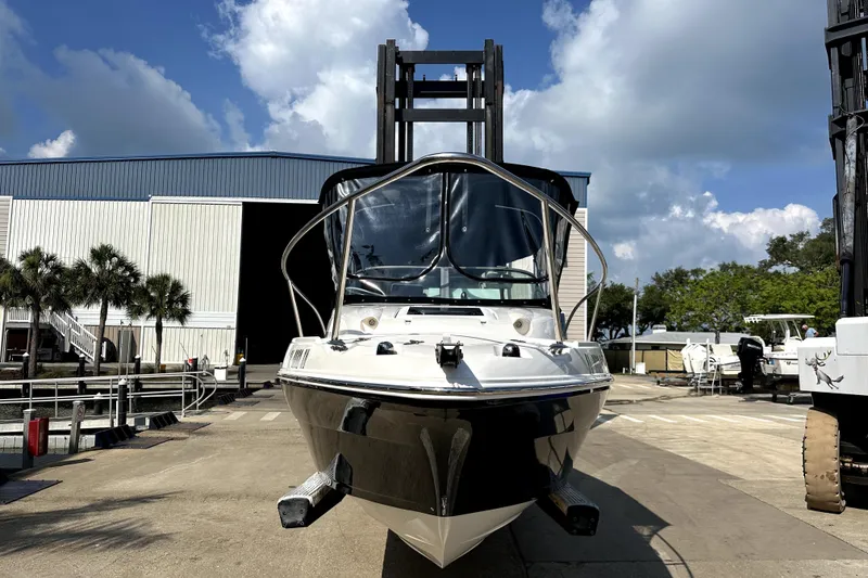 Slide: The Image of 2021 Campion A21 boat on a dock with a warehouse background. - 6