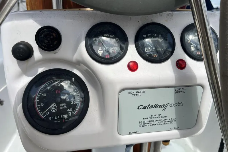 Slide: The Image of Instrument panel of a 2001 Catalina 34 MkII yacht with gauges and indicators. - 11