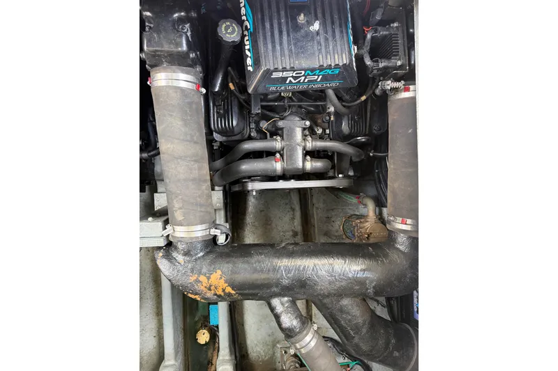 Slide: The Image of Engine compartment of a 1999 Sea Ray Sundancer 310 with MerCruiser 350 MAG MPI. - 30