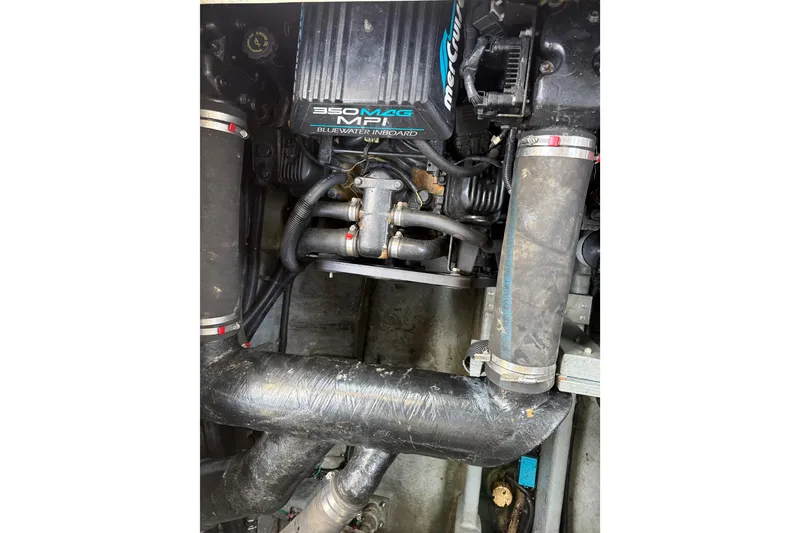 Slide: The Image of Engine compartment of a 1999 Sea Ray Sundancer 310 with 350 MAG MPI motor. - 31