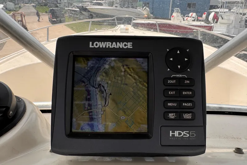Slide: The Image of Lowrance HDS5 GPS on 2004 Pursuit 2670 Cuddy Console boat dashboard. - 30