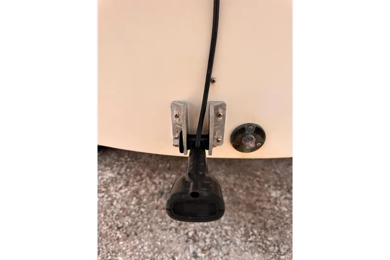 Slide: The Image of Transom-mounted sensor on 2004 Pursuit 2670 Cuddy Console boat. - 59