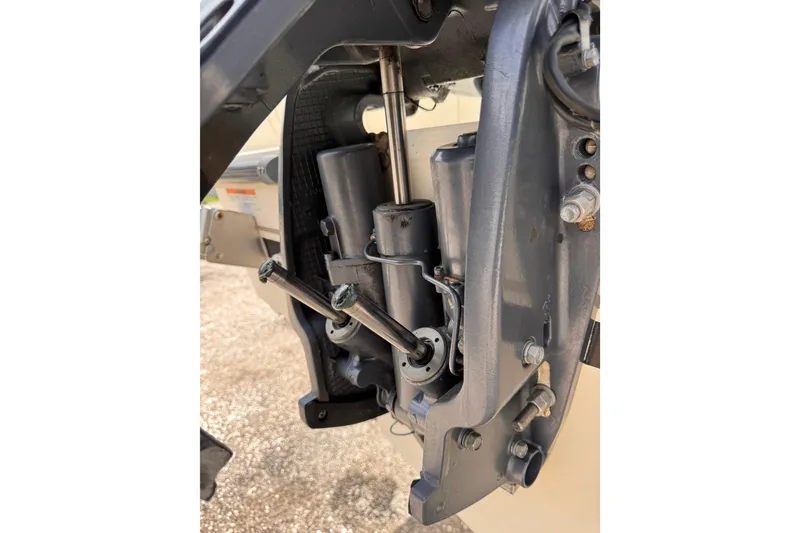 Slide: The Image of Close-up of 2004 Pursuit 2670 Cuddy Console boat engine components. - 61