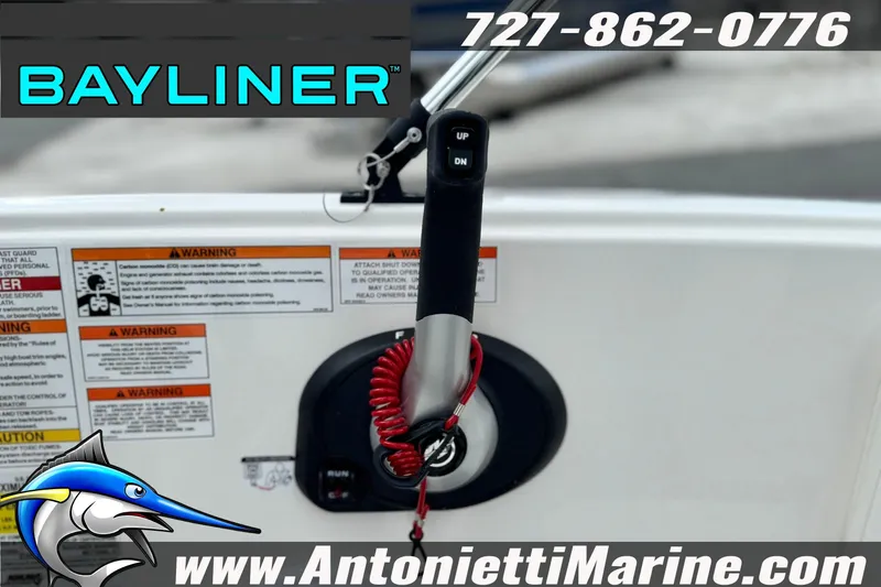 Slide: The Image of Bayliner Element E16 2026 boat control panel with safety warnings and contact information. - 14