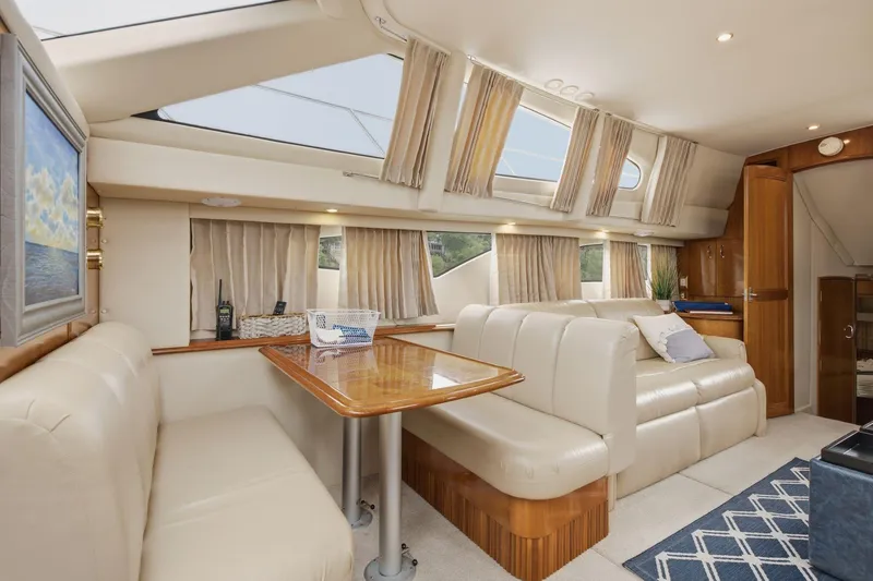 Slide: The Image of Luxurious interior of 2005 Carver 39 Motor Yacht with plush seating and elegant decor. - 30