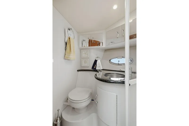 Slide: The Image of Luxurious bathroom in 2005 Carver 39 Motor Yacht with modern fixtures and elegant design. - 37
