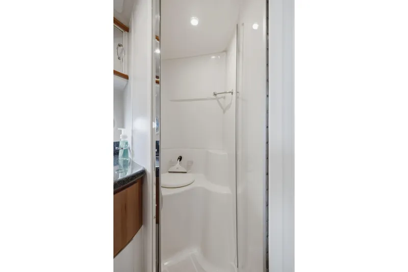Slide: The Image of Bathroom interior of 2005 Carver 39 Motor Yacht with modern shower design. - 42