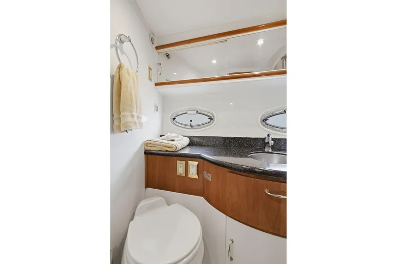 Slide: The Image of Bathroom interior of 2005 Carver 39 Motor Yacht with sink and porthole windows. - 43