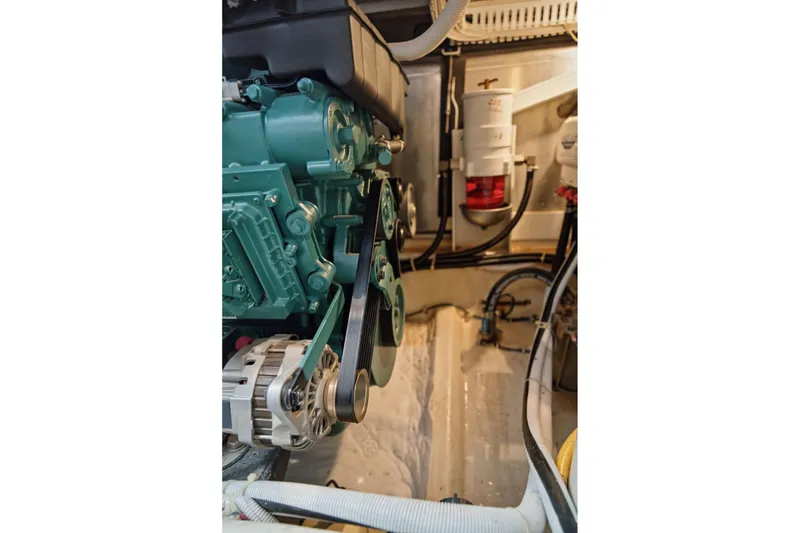 Slide: The Image of Engine room of 2005 Carver 39 Motor Yacht, showcasing mechanical components and systems. - 50