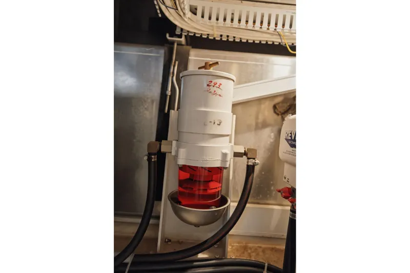 Slide: The Image of Engine room of 2005 Carver 39 Motor Yacht with fuel filter system. - 53