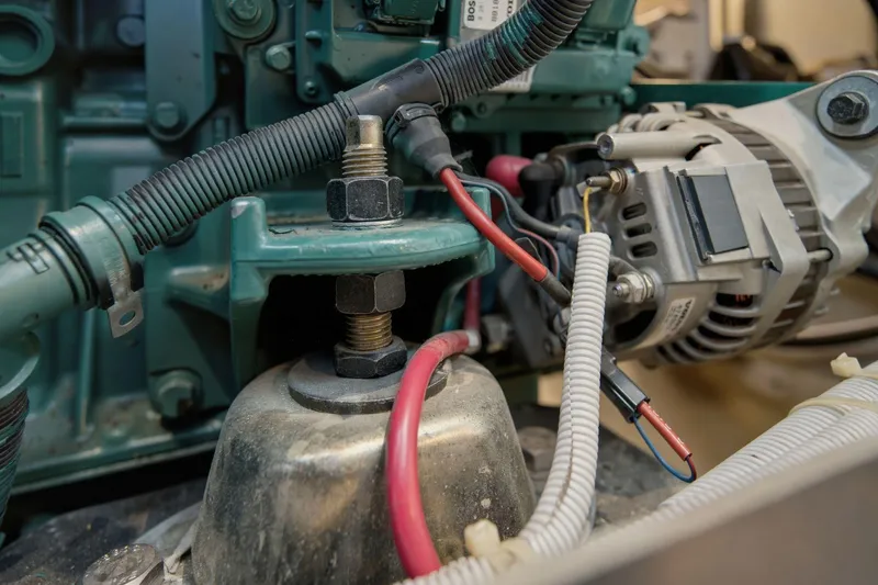 Slide: The Image of Engine components of a 2005 Carver 39 Motor Yacht, featuring wiring and mechanical parts. - 59