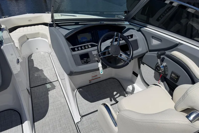 Slide: The Image of 2020 Cobalt R3 boat interior with modern dashboard and steering wheel. - 11