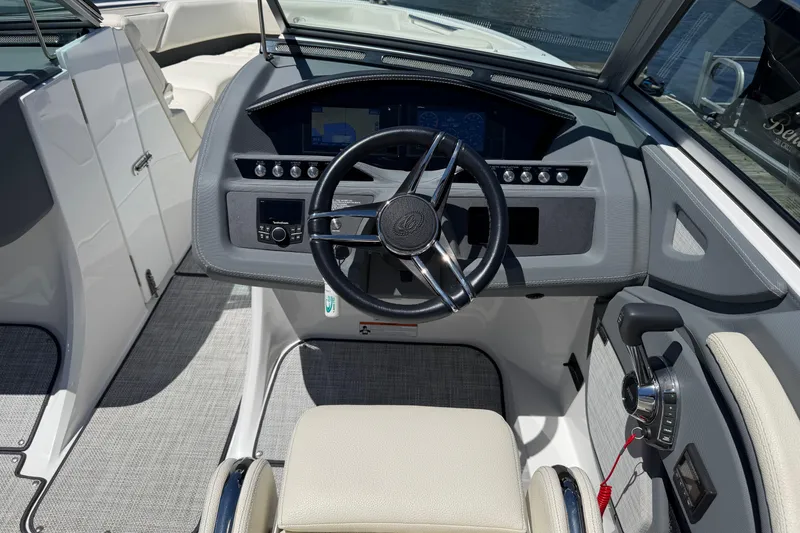 Slide: The Image of 2020 Cobalt R3 boat cockpit with steering wheel and control panel. - 12