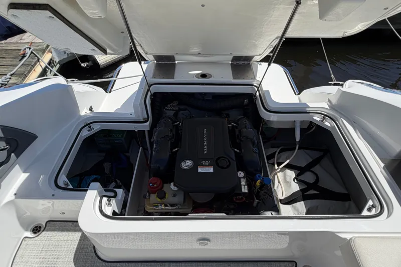 Slide: The Image of Open engine compartment of a 2020 Cobalt R3 boat, showcasing Volvo Penta engine. - 21