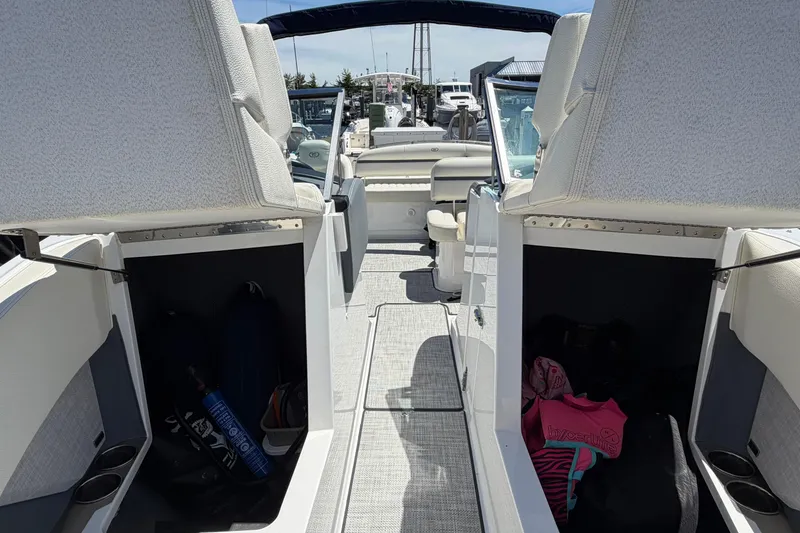 Slide: The Image of 2020 Cobalt R3 boat interior with open storage compartments and seating area. - 6