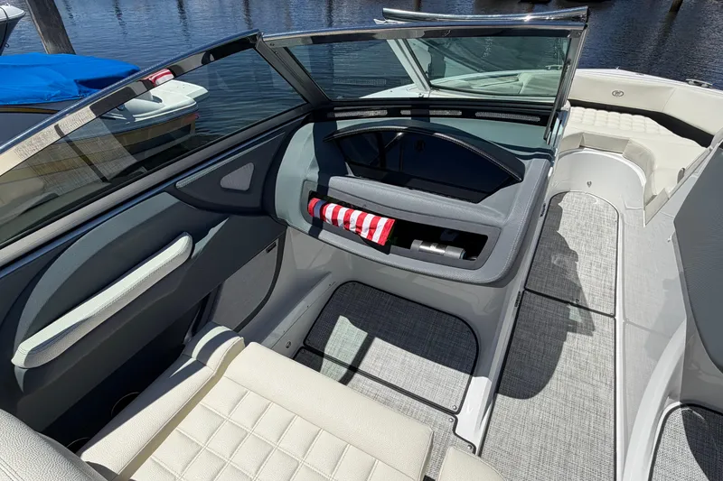 Slide: The Image of Interior of a 2020 Cobalt R3 boat with seating and storage compartments. - 8