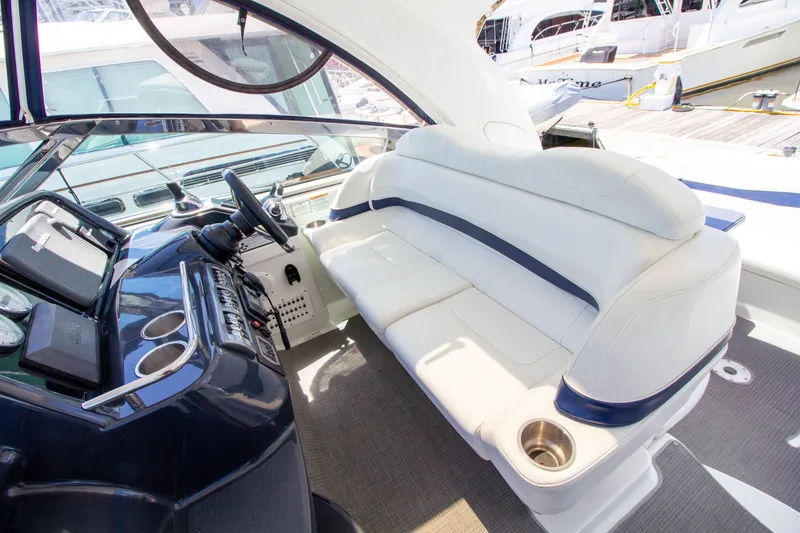 Slide: The Image of Interior of a 2016 Formula 40 Performance Cruiser with white seating area. - 12