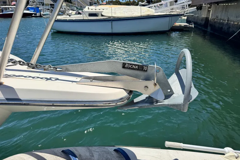 Slide: The Image of Rocna 10 anchor on 2016 Defiance San Juan 250 boat in marina. - 23