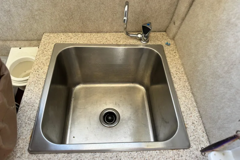 Slide: The Image of Stainless steel sink in 2016 Defiance San Juan 250 boat interior. - 55