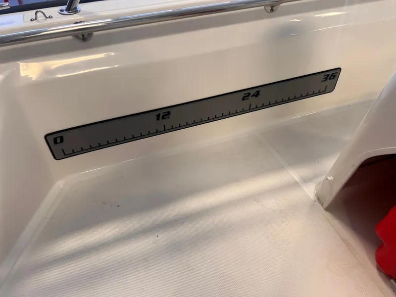 Slide: The Image of Measuring scale on a 2023 Boston Whaler 150 Montauk boat. - 11