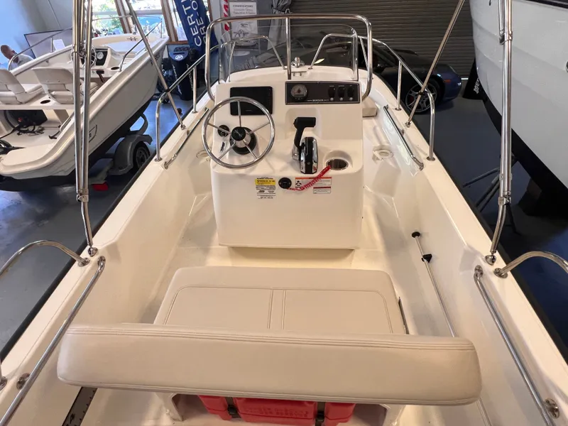 Slide: The Image of Interior view of a 2023 Boston Whaler 150 Montauk boat. - 13