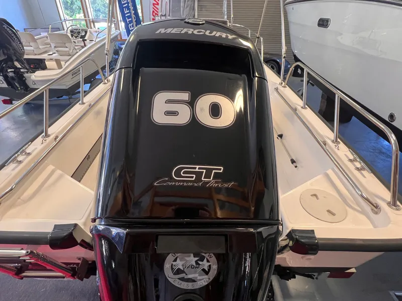 Slide: The Image of Boston Whaler 150 Montauk 2023 with Mercury 60 HP engine. - 14