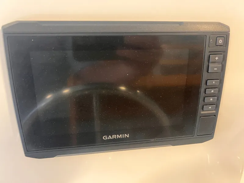 Slide: The Image of Garmin navigation device on a 2023 Boston Whaler 150 Montauk. - 7