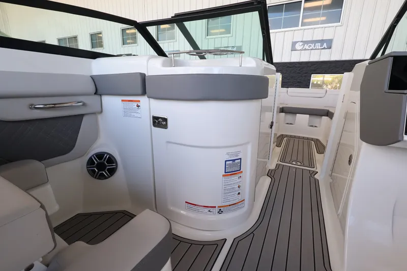 Slide: The Image of The image shows the interior of a Sea Ray SDX 290 Outboard with modern seating and sleek details. - 17