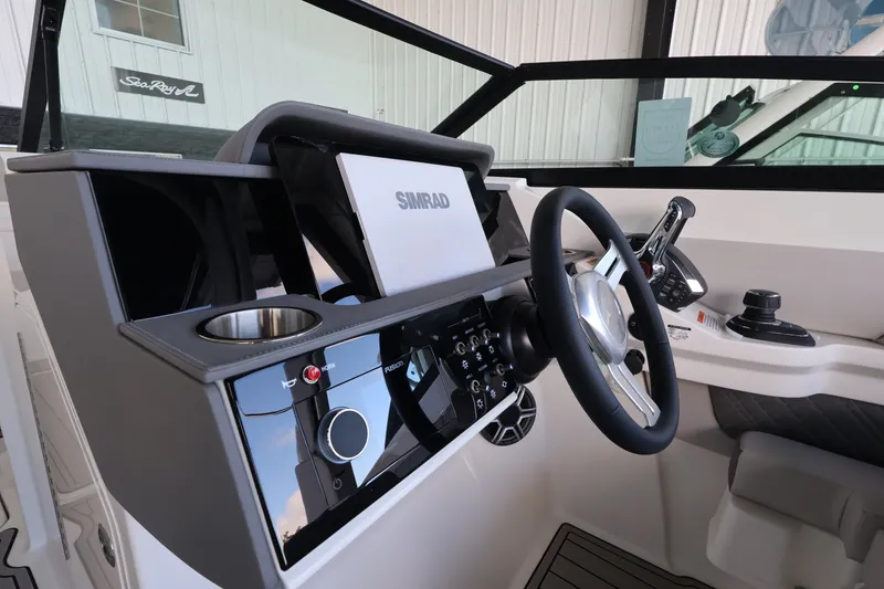 Slide: The Image of Helm of the 2027 Sea Ray SDX 290 Outboard with Simrad display. - 25