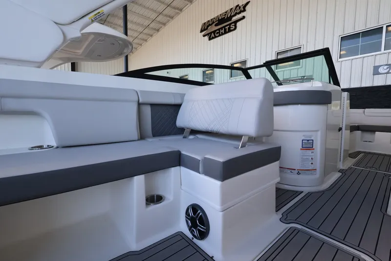 Slide: The Image of The image shows the interior of a 2027 Sea Ray SDX 290 Outboard with gray upholstery. - 15