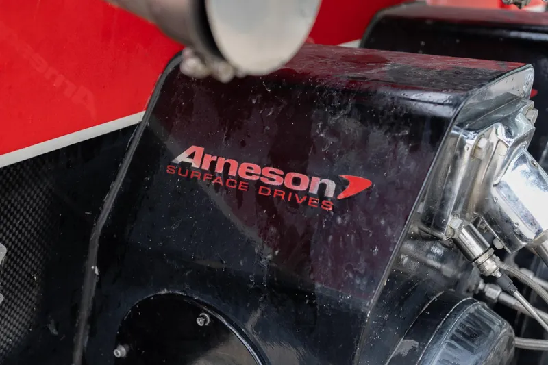 Slide: The Image of Arneson Surface Drives on 2006 Cigarette 39' Top Gun Unlimited boat. - 16