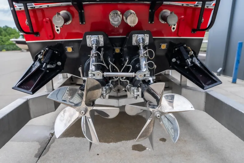 Slide: The Image of Rear view of 2006 Cigarette 39' Top Gun Unlimited boat with dual propellers. - 22