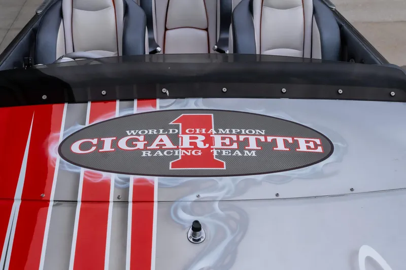 Slide: The Image of 2006 Cigarette 39' Top Gun Unlimited boat with racing team logo on deck. - 27