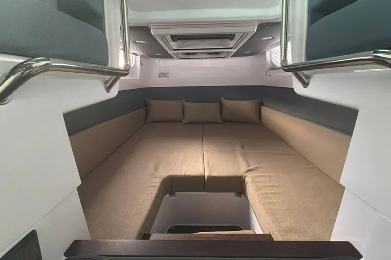 Slide: The Image of Luxurious interior cabin of 2022 Axopar Brabus 37 XC Cross Cabin with plush seating. - 24