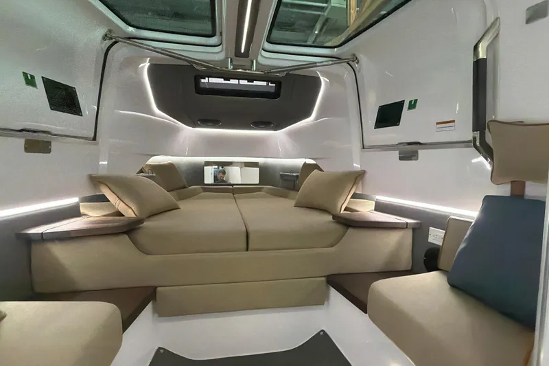 Slide: The Image of Luxurious interior of 2022 Axopar Brabus 37 XC Cross Cabin with modern design and comfortable seating. - 32