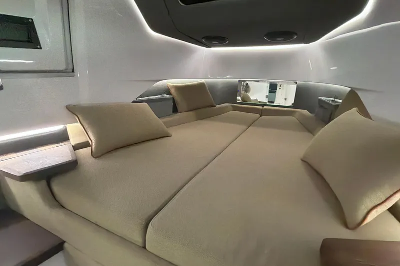 Slide: The Image of Luxurious interior cabin of 2022 Axopar Brabus 37 XC Cross Cabin with plush bedding. - 33