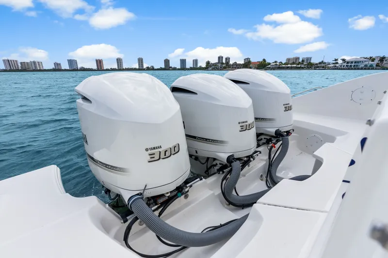 Slide: The Image of Three Yamaha 300 engines on Pursuit DC 365 boat, 2021 model. - 38