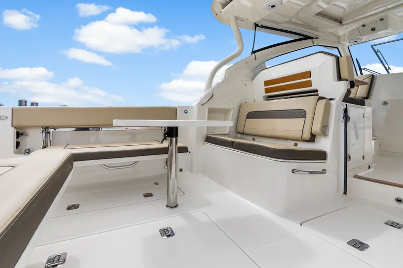 Slide: The Image of Interior of 2021 Pursuit DC 365 Dual Console with seating area. - 43
