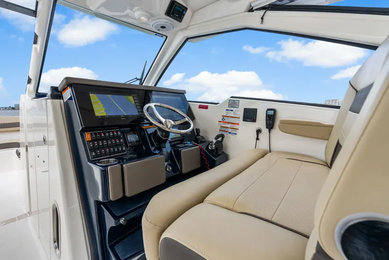 Slide: The Image of Interior of 2021 Pursuit DC 365 Dual Console with helm station. - 48
