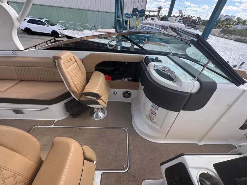 Slide: The Image of Interior of a 2019 Sea Ray SLX 280 with leather seating. - 13