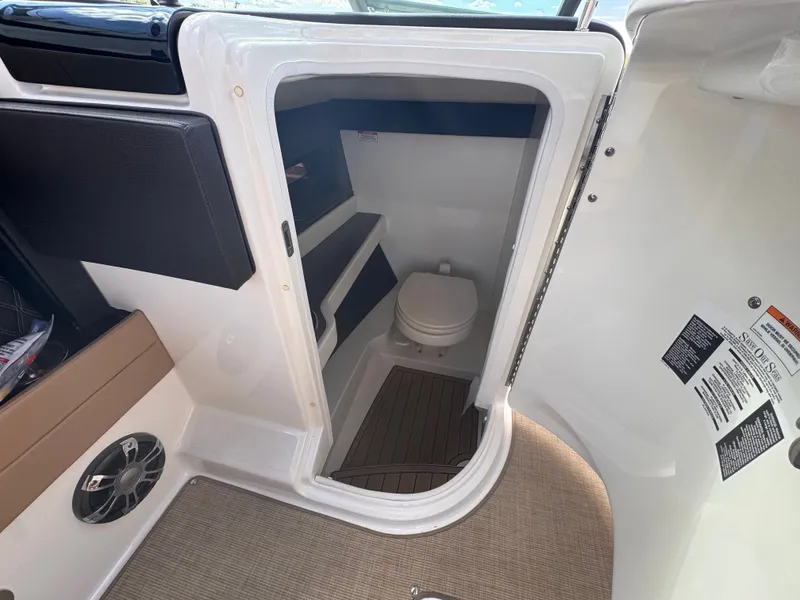 Slide: The Image of Interior of a 2019 Sea Ray SLX 280 yacht with toilet. - 17