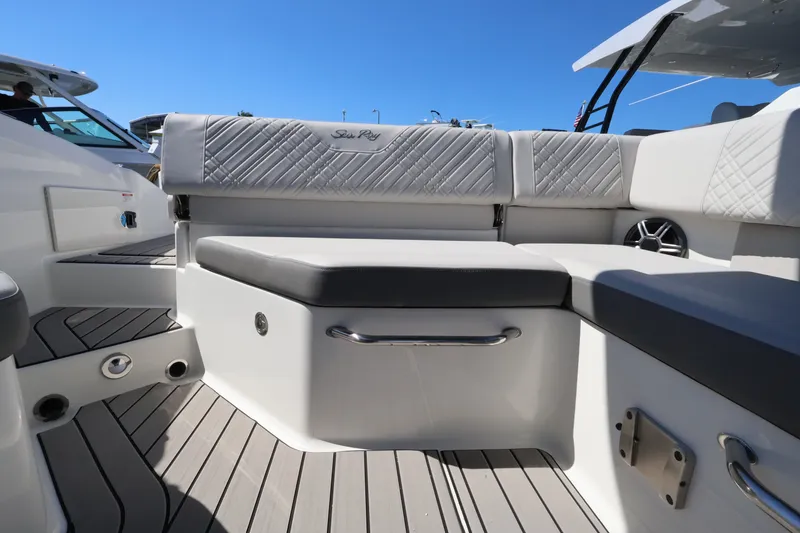 Slide: The Image of The 2027 Sea Ray SDX 270 Outboard features a sleek, cushioned seating area and modern design. - 17