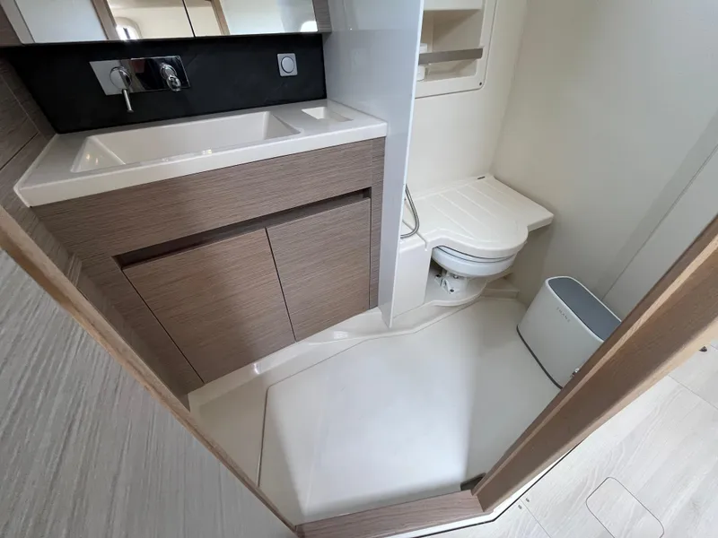 Slide: The Image of Modern bathroom in 2021 Hanse 418 yacht with sink, toilet, and storage. - 28