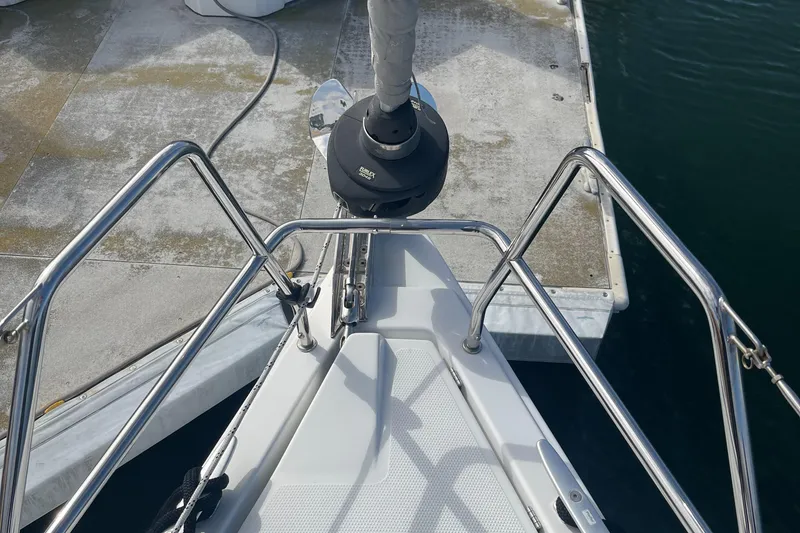 Slide: The Image of Bow of 2021 Hanse 418 yacht docked at marina. - 3