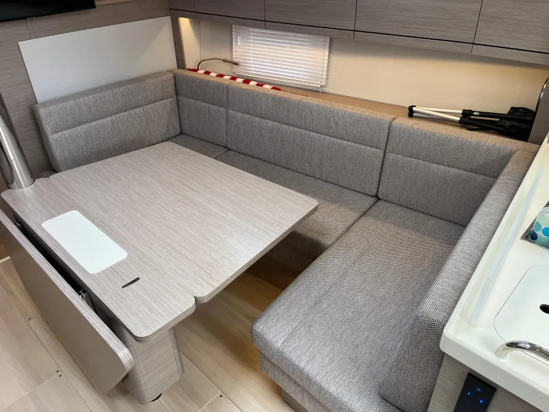 Slide: The Image of Modern interior of 2021 Hanse 418 yacht with cozy seating and dining area. - 42