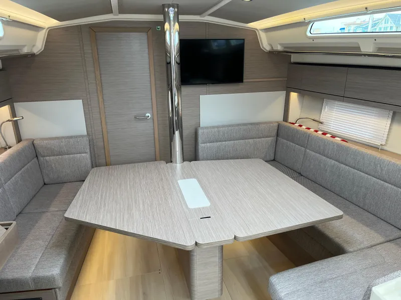 Slide: The Image of Modern interior of 2021 Hanse 418 yacht with dining area and TV. - 43