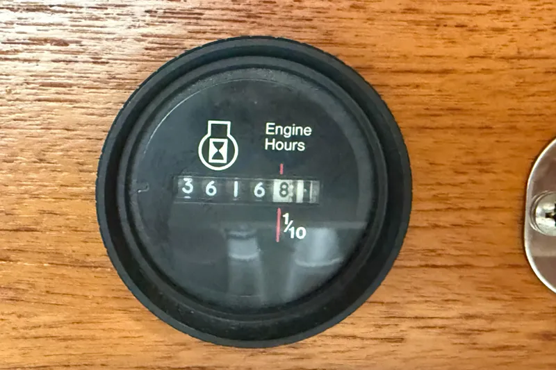 Slide: The Image of Engine hour meter reading 3616.8 on 1988 Ericson 32-200 yacht dashboard. - 27