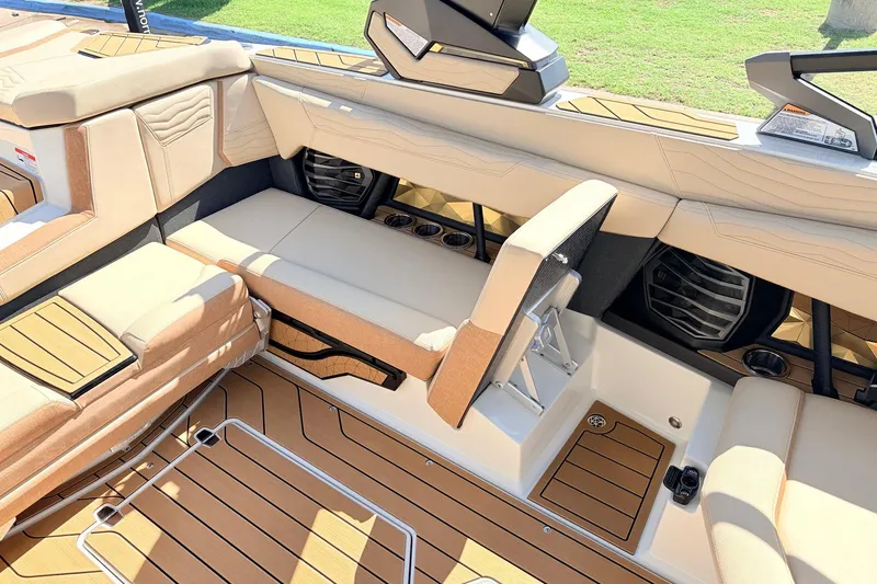 Slide: The Image of 2026 Nautique Super Air Nautique G23 interior with luxurious seating and modern design. - 35